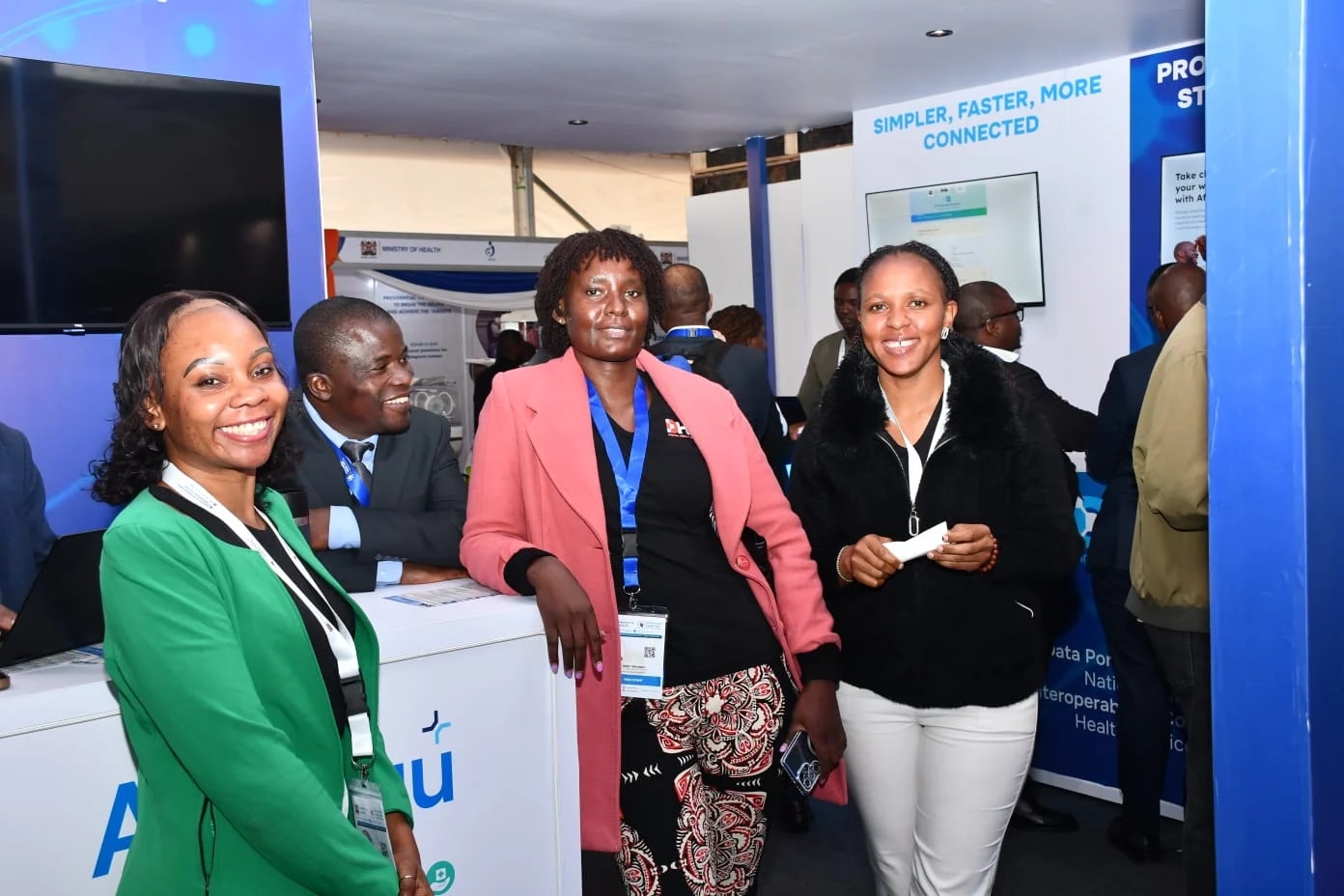 DHA team members engaging visitors at a digital health exhibition